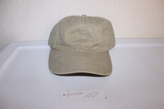beige strapback hat