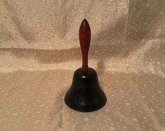 Cast Metal Vintage Hand Bell with Wooden Handle, Metal Clapper, Nice Ring, Well Maintained,         7 3/4” Tall.