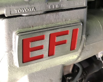 Insignia del motor 3FE "EFI"