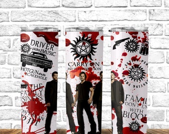 May include: Three stainless steel tumblers with a white background and red blood splatter. The tumblers feature images and text from the TV show Supernatural. The first tumbler says "Driver picks music" and "Hotgun shuts cakehole". The second tumbler says "Carry on my wayward son". The third tumbler says "Family don't end with blood".
