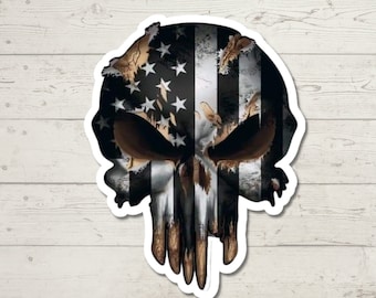 May include: A black and white skull sticker with an American flag design. The skull is distressed and has a grunge look.