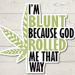 May include: A green marijuana leaf with the text "I'm blunt because God rolled me that way" in black and green text.