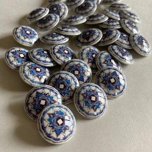 24 mm vintage metal buttons. white with bluette and red geometric pattern, vintage metal buttons