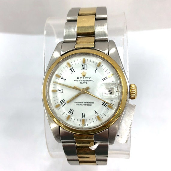 rolex oyster perpetual date gold and steel