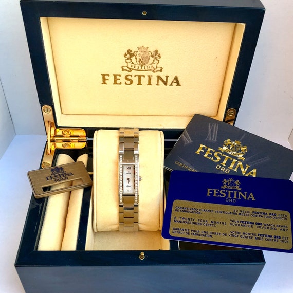 festina 18k gold watch