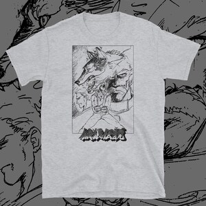 May include: A grey t-shirt with a black and white illustration of a man with a wolf's head. The text "狼男" is printed below the illustration.
