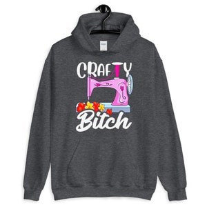 Crafty Bitch Sewing Machine For Creative Women Who Sew Unisex Hoodie Dark Heather