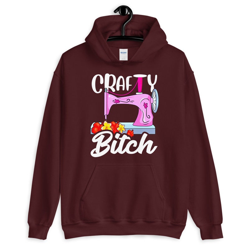 Crafty Bitch Sewing Machine For Creative Women Who Sew Unisex Hoodie Maroon