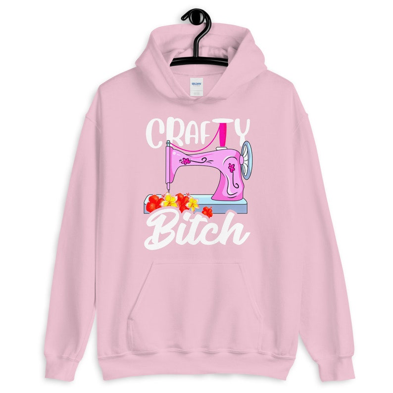 Crafty Bitch Sewing Machine For Creative Women Who Sew Unisex Hoodie Light Pink