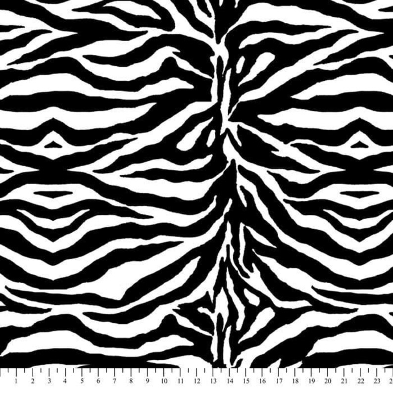 May include: Black and white zebra print fabric. The print features a repeating pattern of black and white stripes.