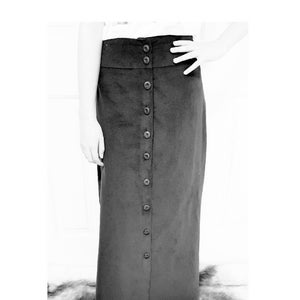 May include: A long, dark grey skirt with a button-up front. The skirt is made of a soft, textured fabric.