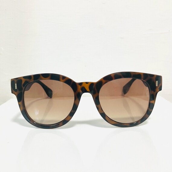 Vintage 90s Tortoiseshell Sunglasses: Round Frame, UVA Protected