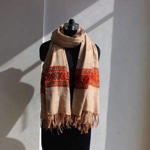 Merino wool unisex meditation shawl in beige and orange color with tassels artisanal cover up