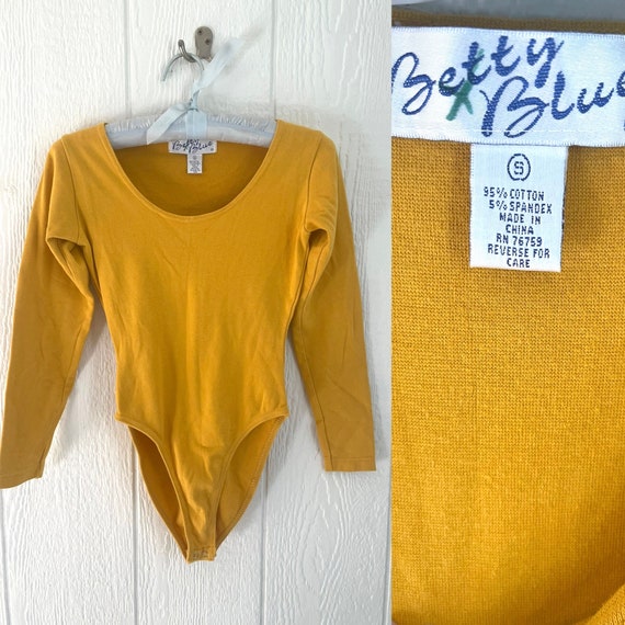 Body mostaza mujer sale