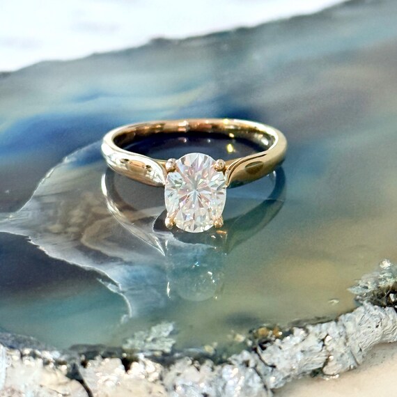 Oval Four Prong Raised Cathedral Solitaire Charles Colvard