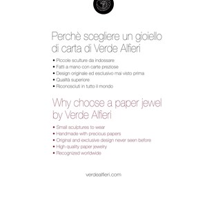May include: White background with text in Italian and English. The text discusses paper jewelry by Verde Alfieri, highlighting features like small sculptures, handmade quality, and original design. The website verdealfieri.com is also displayed.