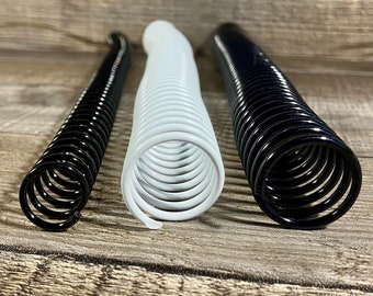 TruBind Spiral Coils, plastic, in 12mm (1/2”) and 20mm (3/4”) diameters.