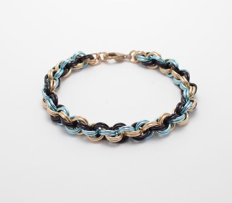 Double Spiral Bracelet in Jewelers Brass and Anodized Aluminum
