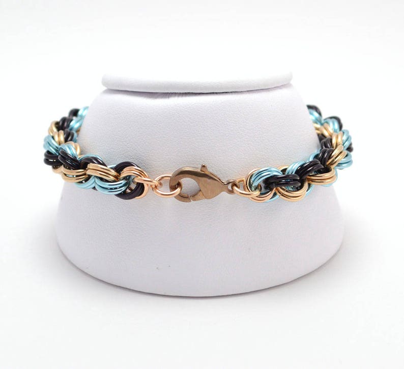 Double Spiral Bracelet in Jewelers Brass and Anodized Aluminum