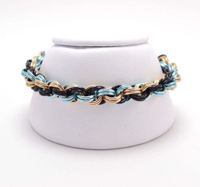 Double Spiral Bracelet in Jewelers Brass and Anodized Aluminum