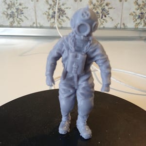 3D printed resin deep sea diver unpainted. Ideal sea scape dioramas.