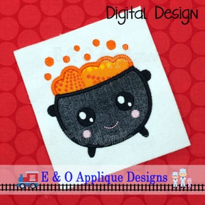 May include: A black cauldron with a cute face and orange bubbling liquid inside. The cauldron has a white background and is surrounded by white dots.