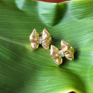 Vintage Nina Ricci Clip On Bow Earrings 22kt Gold Plated Signed Designer Swarovski Crystals