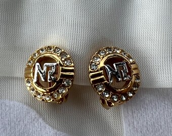Nina Ricci Clip Earrings. Beautiful Pearl Surrounded by