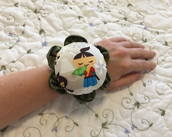 Cojín de pin de muñeca oriental para niños