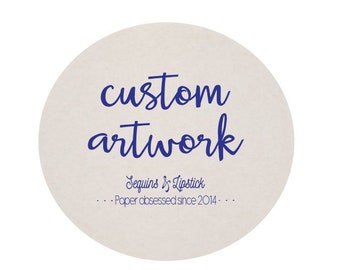 May include: A white circle with the text "custom artwork" in blue cursive writing. Below the text is the text "Sequins & Lipstick" in smaller blue cursive writing. Below that is the text "...Paper obsessed since 2014..." in even smaller blue cursive writing.