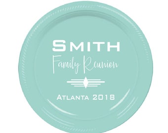 May include: A light blue disposable paper plate with white text that reads "SMITH Family Reunion ATLANTA 2018".