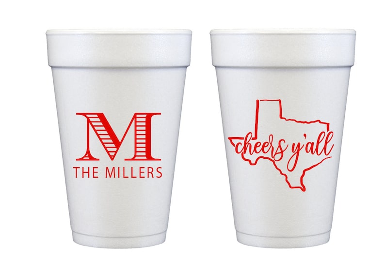May include: Two white foam cups with red designs. One cup has a red letter "M" with stripes and the text "THE MILLERS". The other cup has a red outline of the state of Texas with the text "cheers y'all".