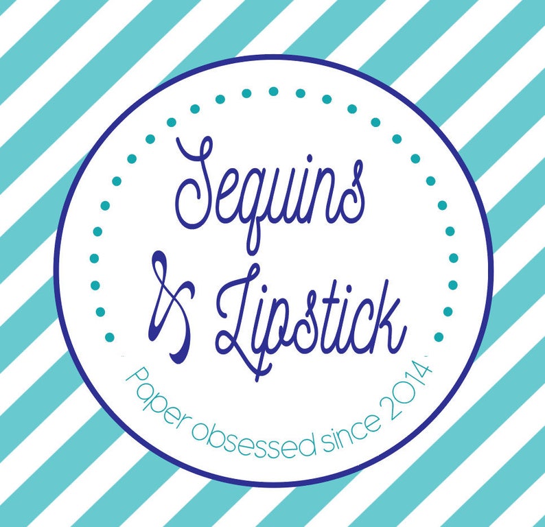 May include: A white circle with a blue border and blue polka dots around the edge. The text "Sequins & Lipstick" is written in blue cursive script. Below the text is the phrase "Paper obsessed since 2014".