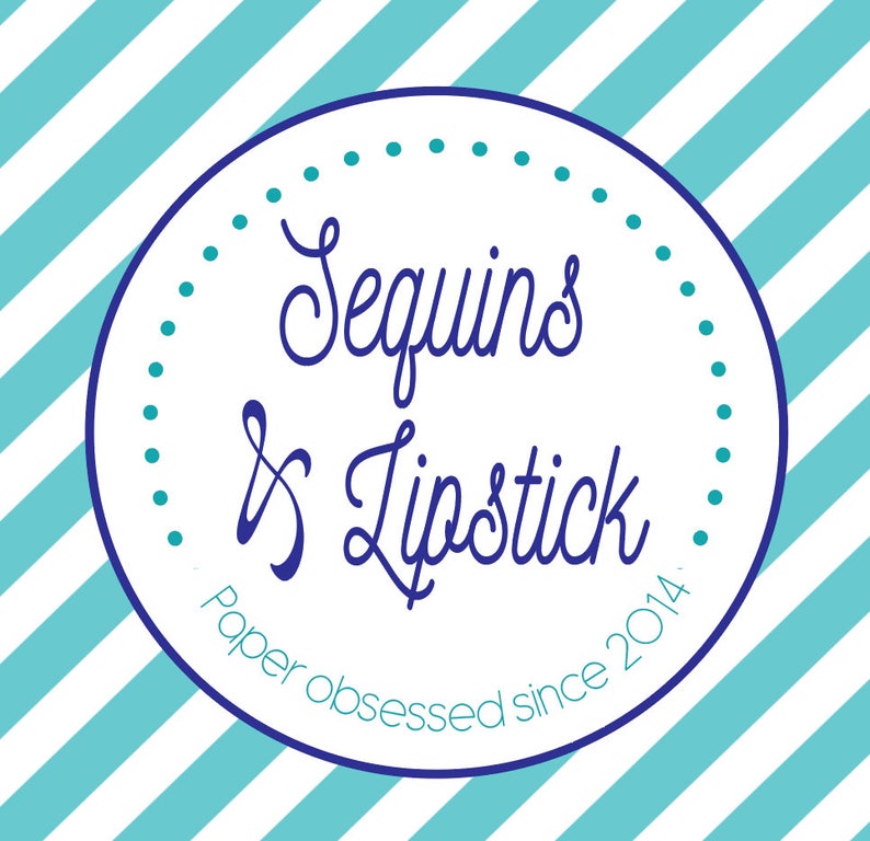 May include: A white circle with a blue border and blue text that reads "Sequins & Lipstick Paper obsessed since 2014."
