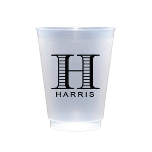 May include: A white plastic cup with a black letter H and the word HARRIS printed on it.