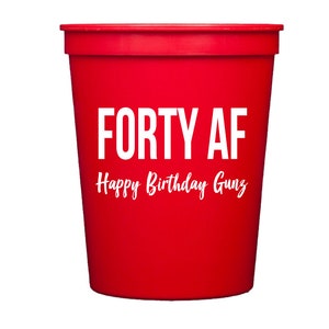 May include: Red plastic cup with the text "FORTY AF" and "Happy Birthday Gunz" in white.