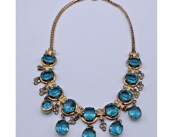 Superbe collier plastron vintage en cristal bleu turquoise doré Art déco