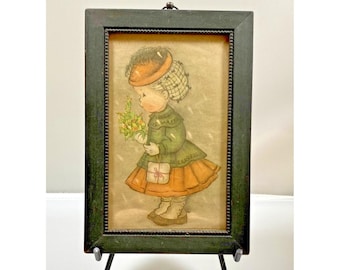 Biglietto d'auguri vintage Hummel in stile artistico con cornice nera, dolce ragazza con bouquet di neve