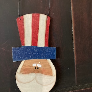 Enfeite do Tio Sam. Decoração fofa para árvore de lápis patriótica de verão.