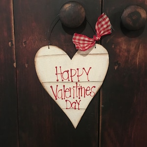 Wood valentine heart hanger.