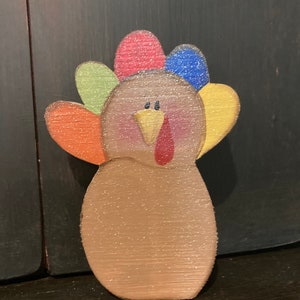 Cute sitting Turkey. Thanksgiving decoration.