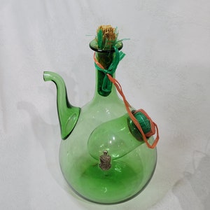 Vintage green wine bottle with ice caddy