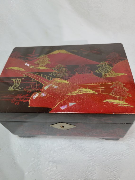 Vintage Japanese black lacquer musical jewelry box