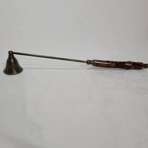 Éteignoir à bougies en laiton antique