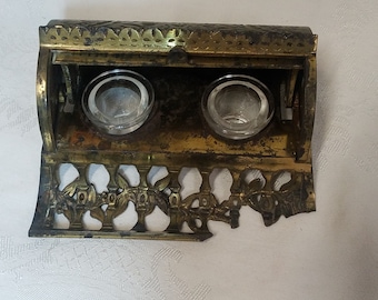 Vintage cast iron double inkwell with roll top lid