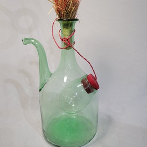 Vintage green wine bottle with ice caddy