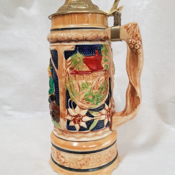 Vintage Tilso musical German beer stein/tankard, with scenes of children and houses