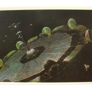 May include: An artistic illustration of a futuristic space station with a large, web-like structure and several green spherical components. The artwork is set against a dark, starry background, with other spacecraft visible.