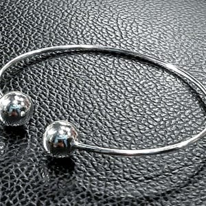 Torque bangle Sterling silver torque bracelet Adjustable bracelet Unisex cuff bangle Mens torque cuff Two balls bangle Double ball bracelet