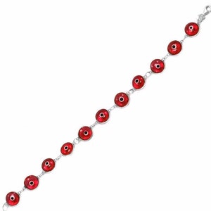 May include: A silver bracelet with red evil eye charms. The bracelet is made of a chain with round red charms with a black eye in the center.
